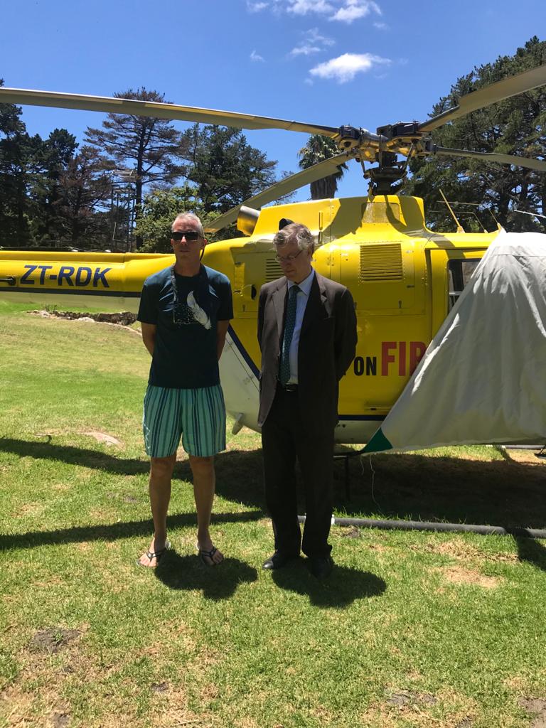 Peter Ryan and Dr Paulsen with helicopter